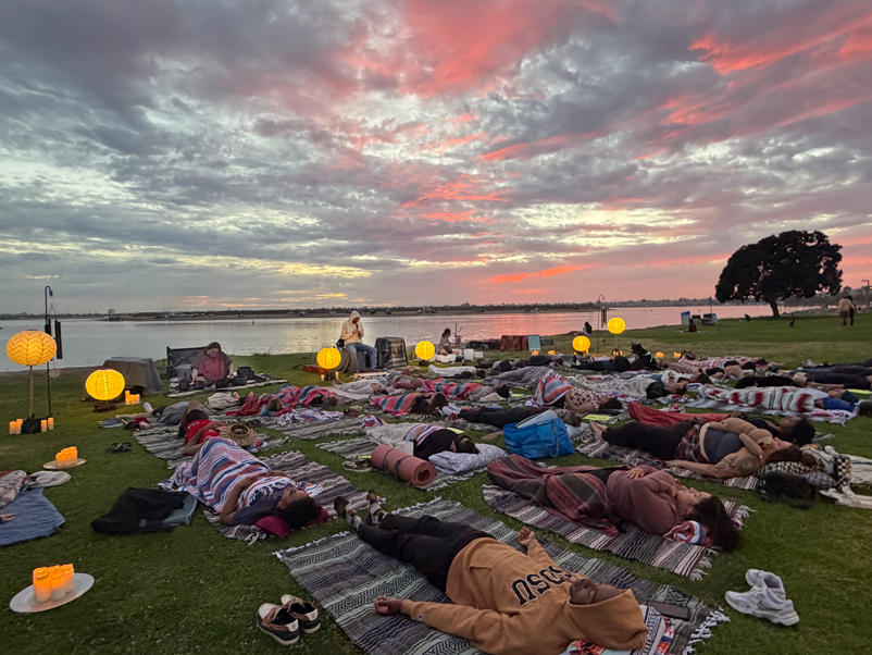 Group soundbath on the grass